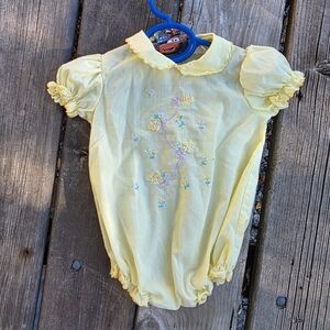 Charming Yellow Kids Bodysuit with Floral Design
